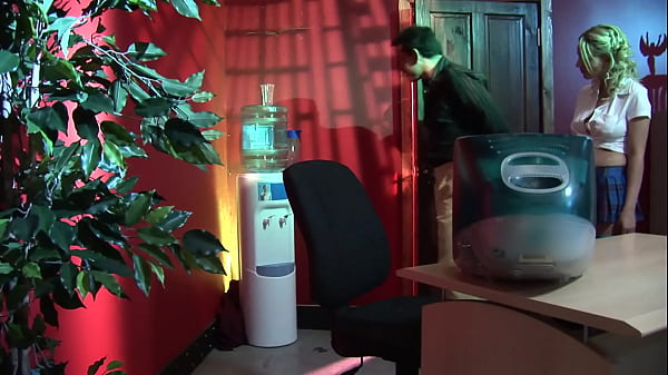 A sexy blonde, after fucking on the desk and on the chair, gets a cum load on her mouth and a golden shower on her big boobs